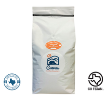 Load image into Gallery viewer, 5lb Whole bean bag | Tanzania Origin | Medium Roast | Organic & freshly roasted coffeeLocated in Mbeya, Mbozi at an elevation of 1,700-1800m, this AA 100% Arabica coffee produces an Earthy Aroma with the distinct flavors of Tangerine and Black Tea. This coffee also exudes a silky body with bright acidity.